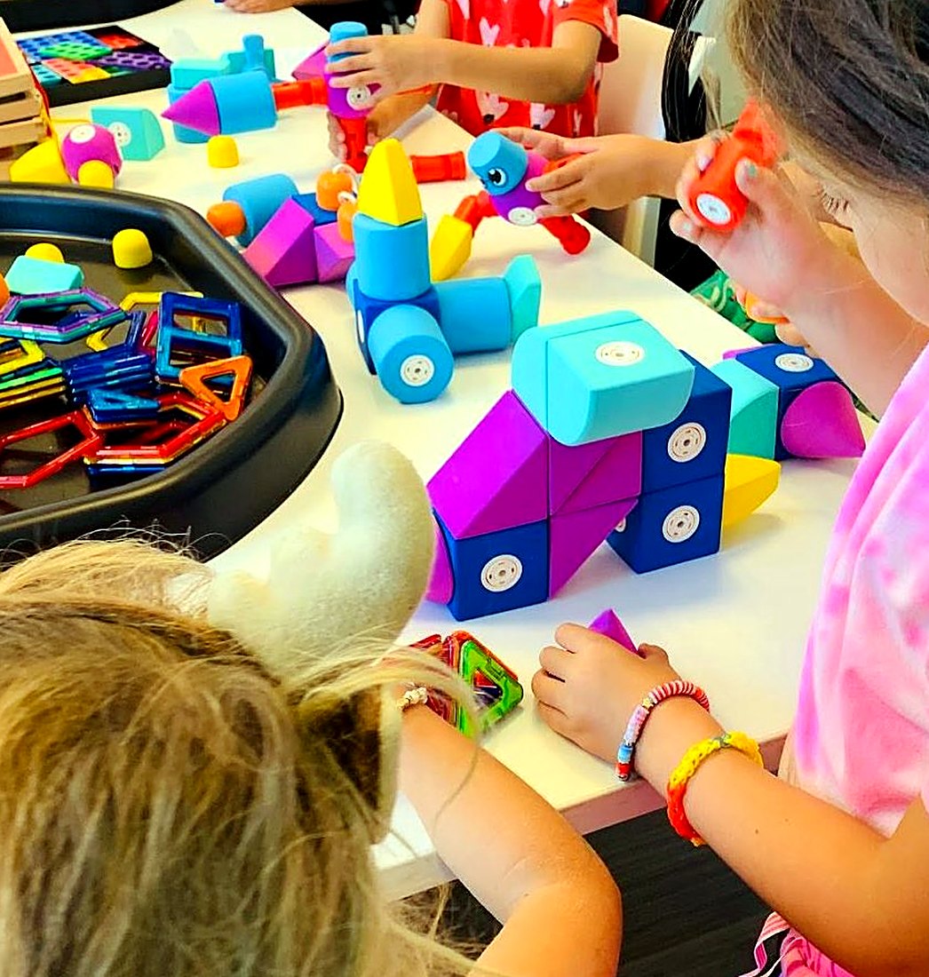 Building with giant blocks at camp